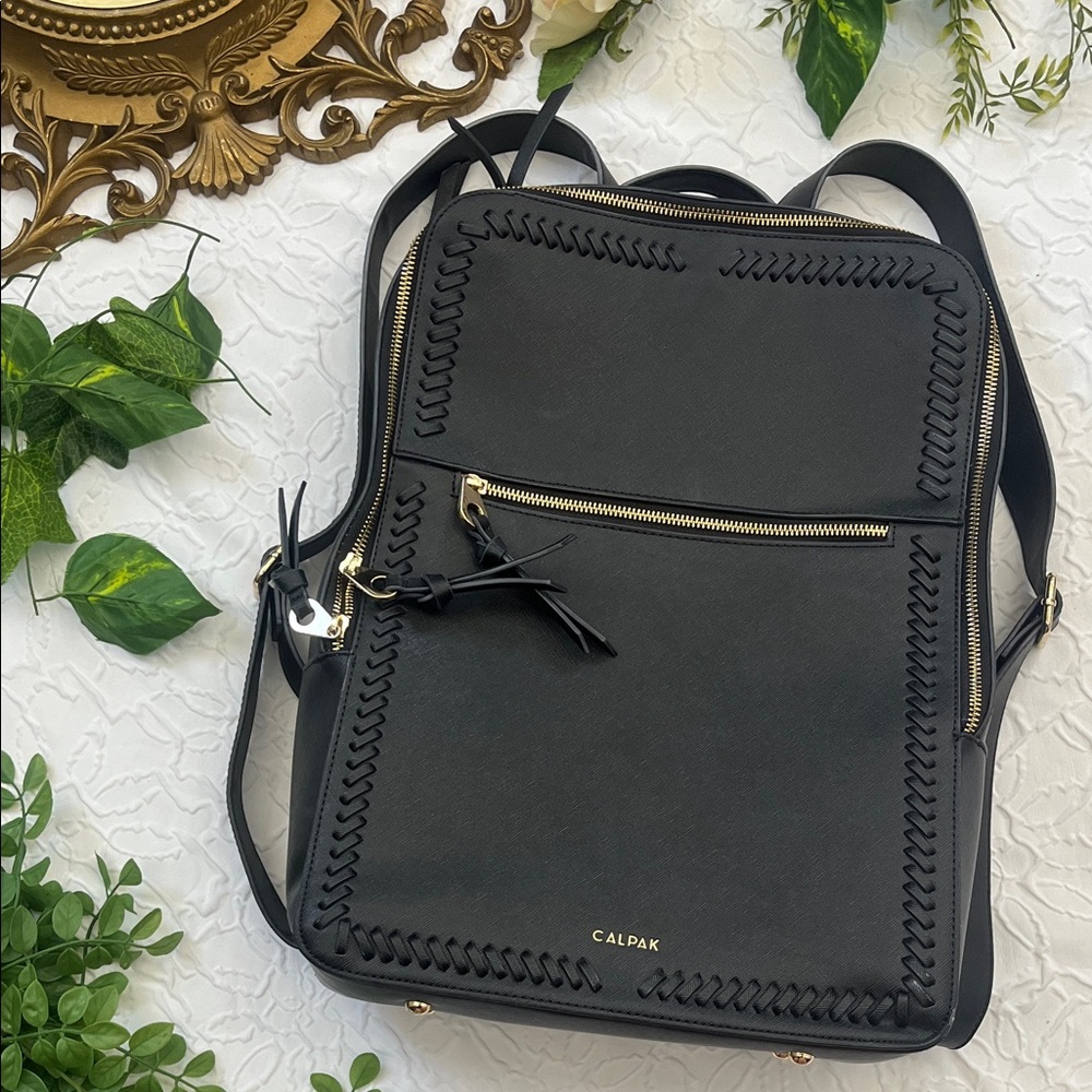 Calpak Black Backpack with Gold Zippers